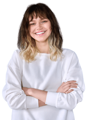 young girl smiling and crossing her arms